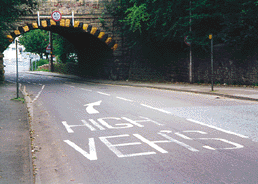 Hazard awareness - What should you do as you approach this overhead bridge?