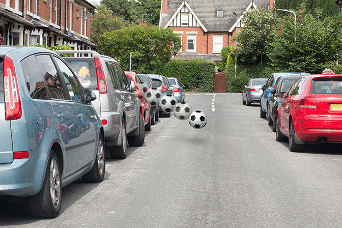 Vulnerable road users - You're driving past a line of parked cars. What should you do if a ball bounces out into the road ahead?