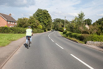 Alertness - You're travelling along this road. How should you pass the cyclist?