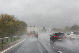 Hazard awareness - What should you do if it's raining and you're following this lorry on a motorway?