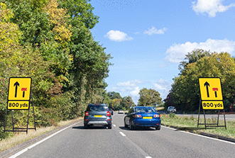 Hazard awareness - What should you do if the traffic in the left-hand lane is slowing?