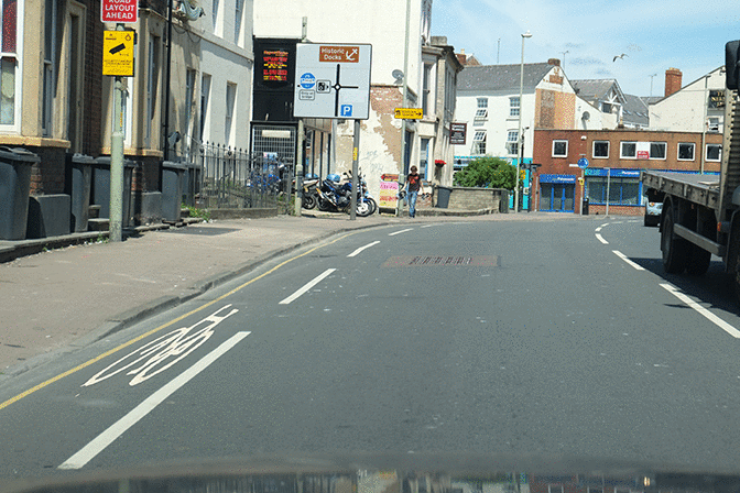 Rules of the road - You're driving on a road that has a cycle lane. What does it mean if the lane is marked by a broken white line?