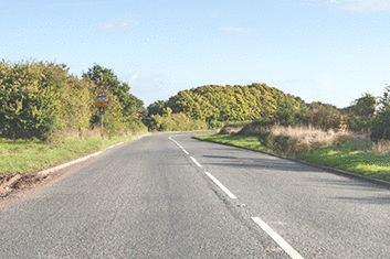 Road and traffic signs - What do the long white lines along the centre of the road mean?